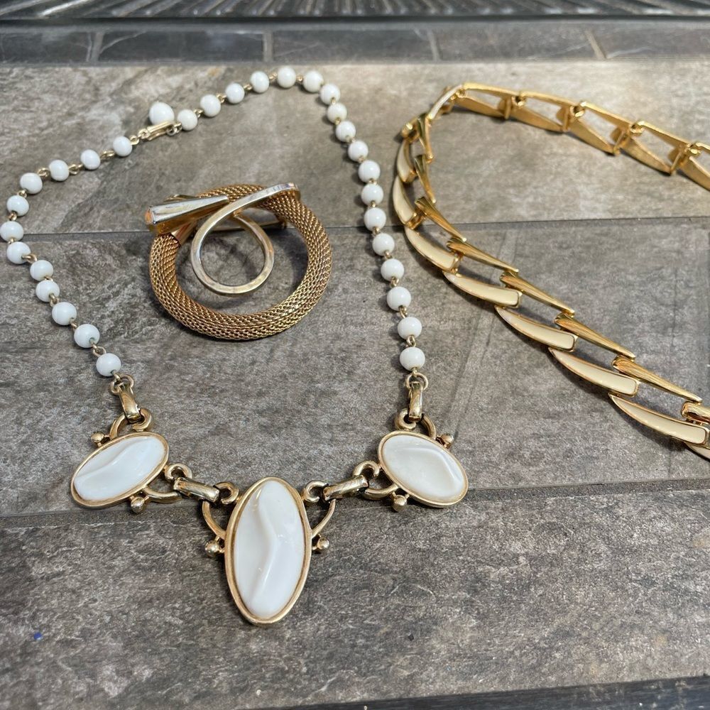 Vintage Monet plus other choker necklaces and a gold tone broach